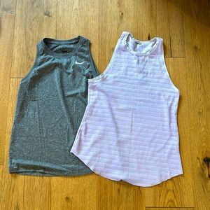 Two Nike tanks